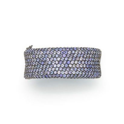 null Large silver cuff bracelet s decorated with tanzanites all weighing 80 cts approximately
Gross...