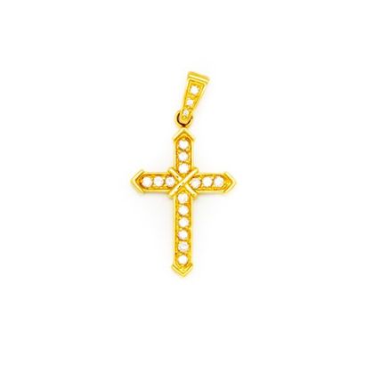 null Cross in yellow gold decorated with a paving of White Stones Gross 
weight :...