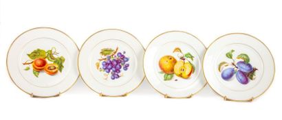 null PARIS
Suite of four porcelain plates with polychrome enamel decoration of natural...