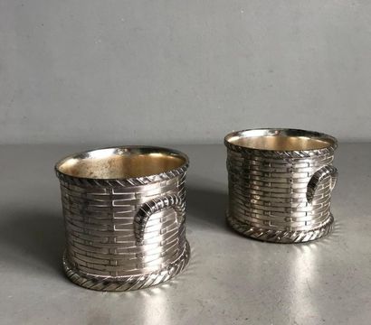 null Pair of silver plated metal bottle displays in the shape of plaited baskets
H....