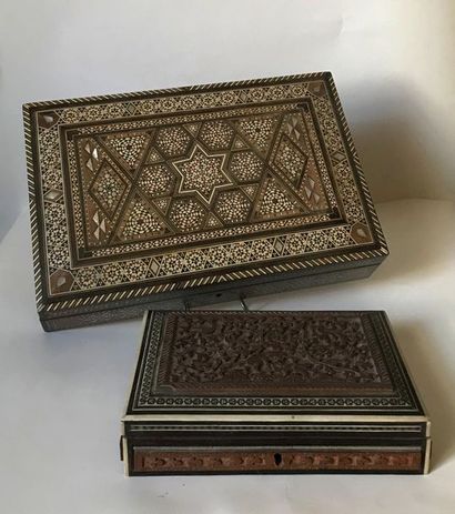 null Two rectangular wooden boxes decorated with inlays of light wood and bone with...