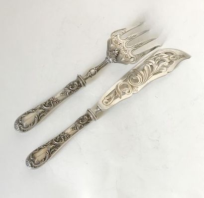null Openwork steel fish cutlery chiselled on a silver handle filled (Minerva hallmark)...