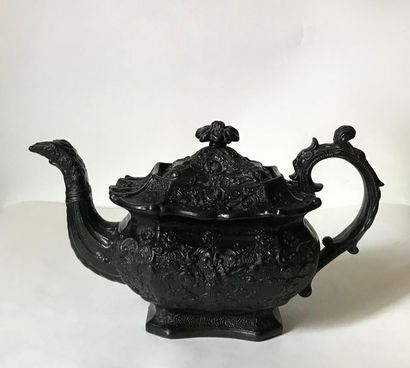 Large black glazed ceramic teapot with rich...