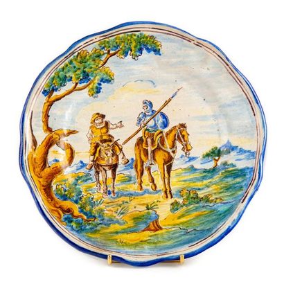 null Earthenware plate with polychrome decoration depicting Don Quixote and Sancho...