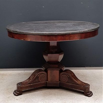 null Pedestal table with a round grey marble top resting on a mahogany veneer baluster-shaped...