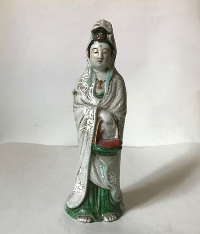 null Kwanyn polychrome
porcelain statue of Kwanyn Japan 
H. 24 cm