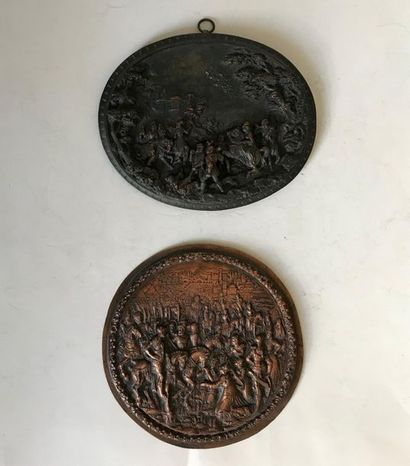 null Two metal medals with embossed decoration of hunting or historical scenes in...