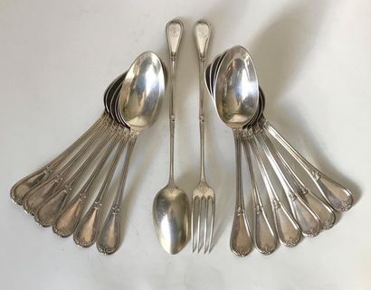 null Set of twelve large spoons and a silver salad servers moulded and chiselled...