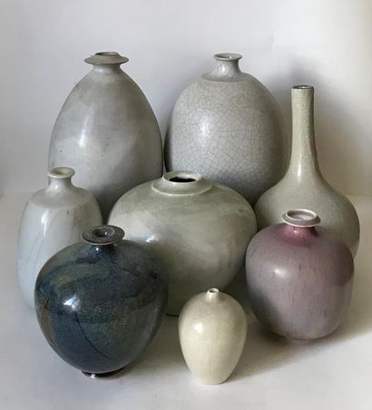 null P. LEMAITRE - LANOS ...
Set of seven green, white or cream
glazed ceramic vases...