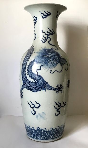 null CHINA
Large baluster-shaped porcelain vase with blue-white swirling decoration...