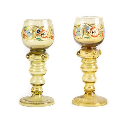 null Two stemmed glasses, smoked color with enamelled decoration of flowers in the...
