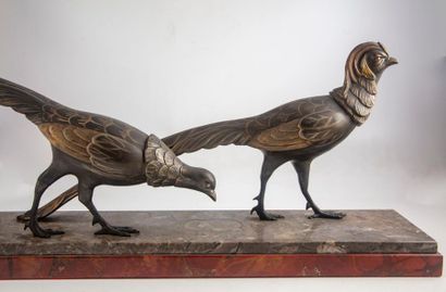 SALVATORE MELANI Salvatore MELANI (1902 - 1934)
Two pheasants in zinc gilded metal,...