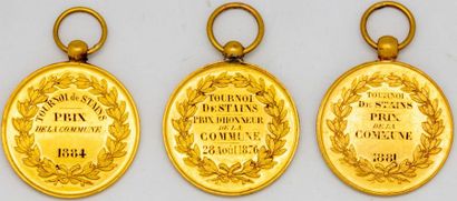 null Three medals in yellow gold - Tournament of Stains, prize of honour of the commune,...