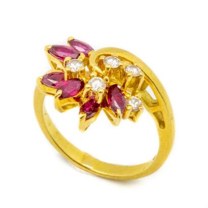 null Yellow gold ring decorated with small diamonds and rubies forming a flower
Size...