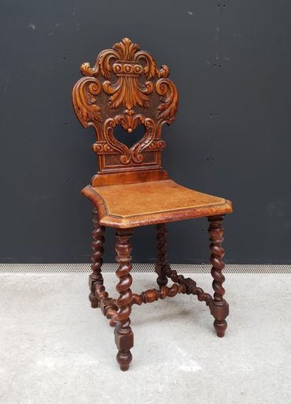 Moulded and carved wooden chair with acanthus...