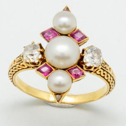 null Yellow gold ring adorned with three button pearls shouldered with small clove-set...