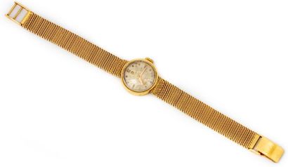 OMEGA OMEGA
Ladies' watch in yellow gold, round dial, flexible bracelet with ribbon
Gross...