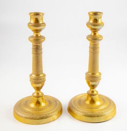 null Pair of gilt bronze candleholders. Restoration period
H.: 24,5cm
Without the...