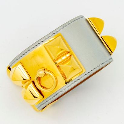 HERMES HERMES Paris
Studded smooth calf leather bracelet, decorated with a golden...