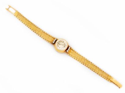 OMEGA Maison OMEGA
Ladies' watch in yellow gold, amati-scaled bracelet finished with...