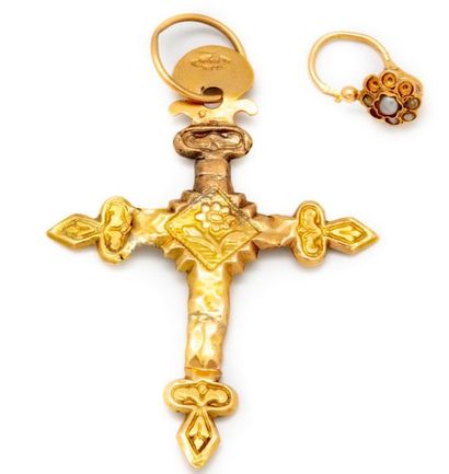Yellow gold cross - a gold sleeper is attached...