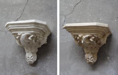 Two large sconce brackets that can form a...