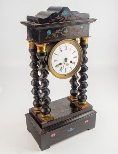 Blackened wood portico clock with twisted...