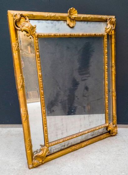 Mirror with gilded wooden brackets shell-shaped...