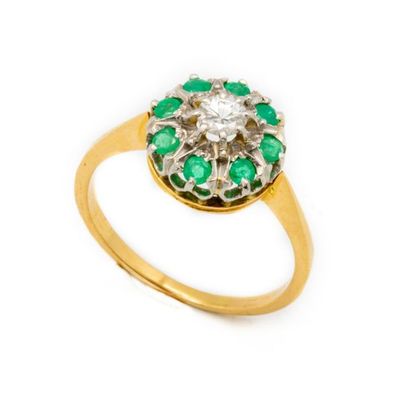 null Yellow gold setting ring set with a bezel centered with a diamond surrounded...