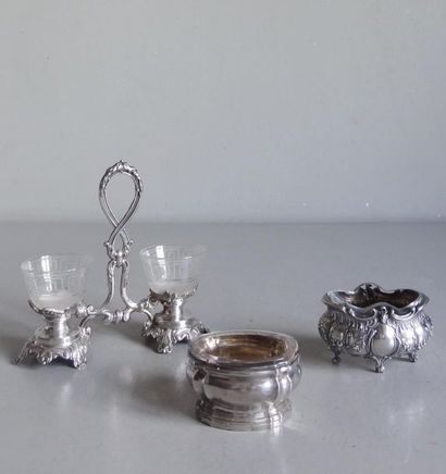 null Set of mismatched silver-mounted salt shakers: a double salt shaker chiselled...