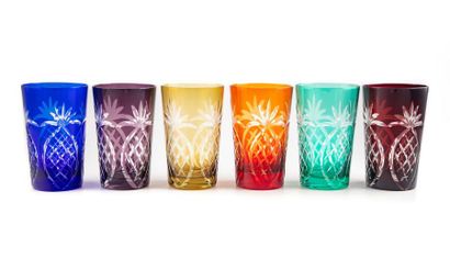 null 6 coloured glasses with orangeade in cut glass with pineapple decoration