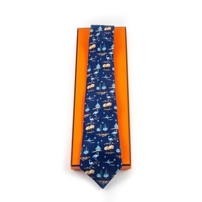 HERMES HERMES - Paris Silk
tie " Tams-tam et égrettes sur fond de case " blue
background...