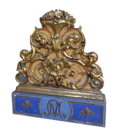 null An important wrought iron candleholder with a lacquered and gilded wooden structure...