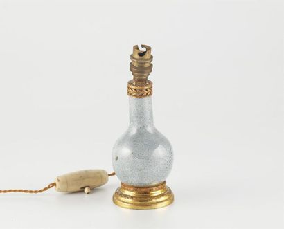 null Small bottle vase in flamed ceramic ( China ?) with golden brass frame. (Electrically...