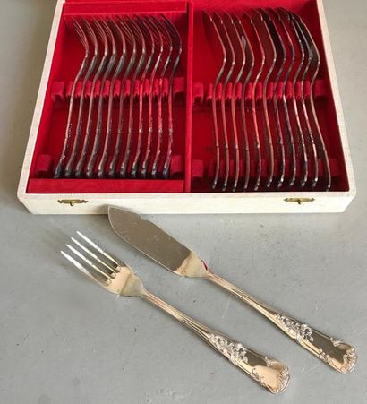 null Set of twelve silver plated metal fish cutlery in a violin shape, moulded and...