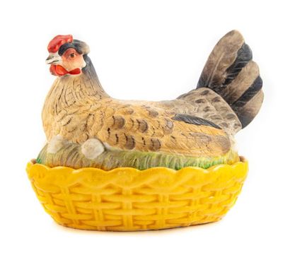 null Glazed earthenware egg box in the shape of a hen brooding on a basket.
L.: 20...