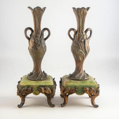 null Pair of vases (scythe) or candlesticks in patinated ruler resting on a marble...