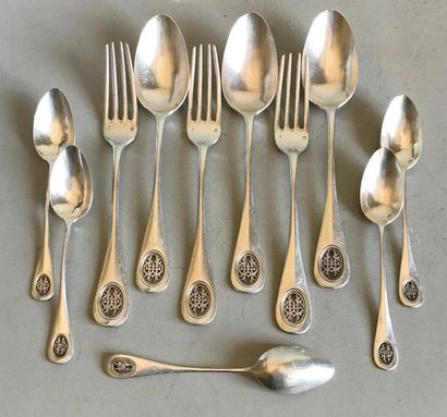 null Set of three table cutlery and five small spoons in plain silver with an openwork...