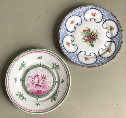 null Set of two porcelain plates, one decorated with cherubs in pink monochrome in...