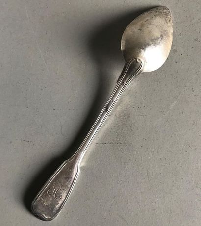 null Large moulded silver serving spoon with double threads and contours. Encrypted....