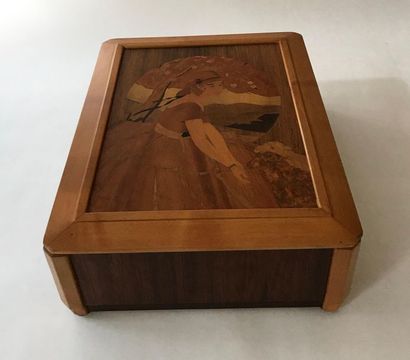 null Jewelry box made of veneer wood. The lid uncovering a mirror is inlaid with...