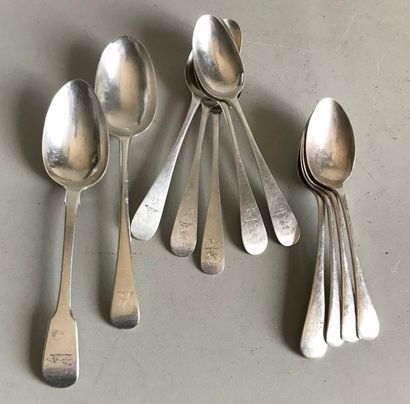 null Set of five silver spoons with inscription engraved on the spatula. 
Two large...