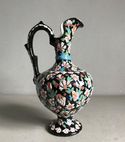 null Large glazed ceramic ewer in the form of a baluster, decorated on a black background...