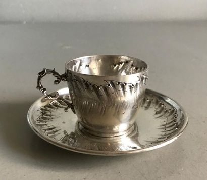 null Silver cup and saucer chased with Rocaille motifs around a medallion. Style...