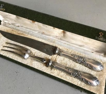 null Steel cutlery and silver plated metal handle chiselled with foliage in the Rocaille...