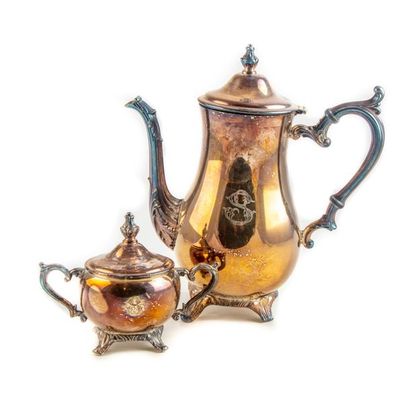 null English silver metal sugar bowl - a sugar bowl is attached to the damaged m...