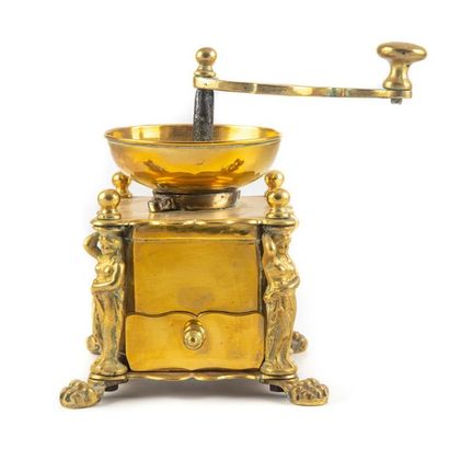 null Coffee grinder with bronze and brass structure and cariathide uprights. Legs...