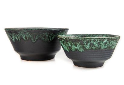 null Two black lustre ceramic bowls with candle glazed decoration
Circa 1950
D.:17...