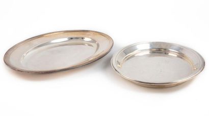 CHRISTOFLE CHRISTOFLE
Set of two silver-plated metal dishes, one of which is engraved...