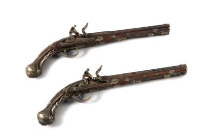 null Pair of flintlock pistols, locks with finely engraved flat body and rear safety,...